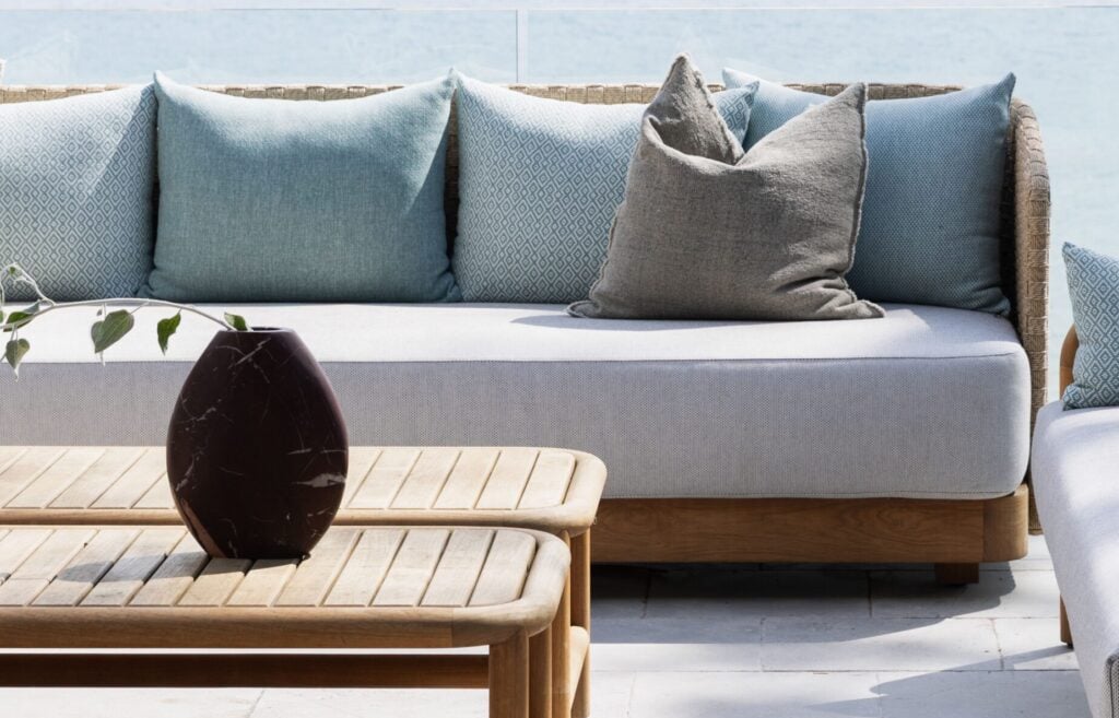 Provence outdoor sofa with cushions and coffee tables