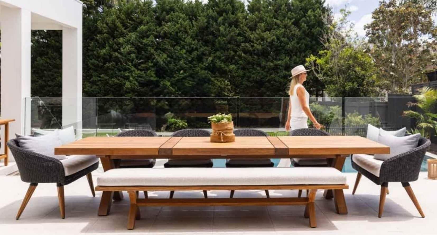 New teak dining table